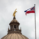 The old state flag flies over the Mississippi State Capitol building in Jackson, Mississippi on June 29, 2020. Lawmakers in Mississippi voted to remove the Confederate battle standard from the state flag after nationwide protests drew renewed attention to symbols of the United States’ racist past.